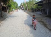 Belum Selesai Dibangun, Paving TMMD Ke-129 Sudah Jadi Tempat Main Favorit Balita
